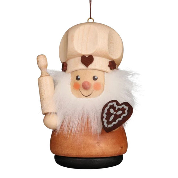 Christian Ulbricht gingerbread baker ornament in natural wood finish.
Wooden baker ornament with rolling pin, white beard, and gingerbread heart.
German-made hanging ornament shaped like a cheerful baker.