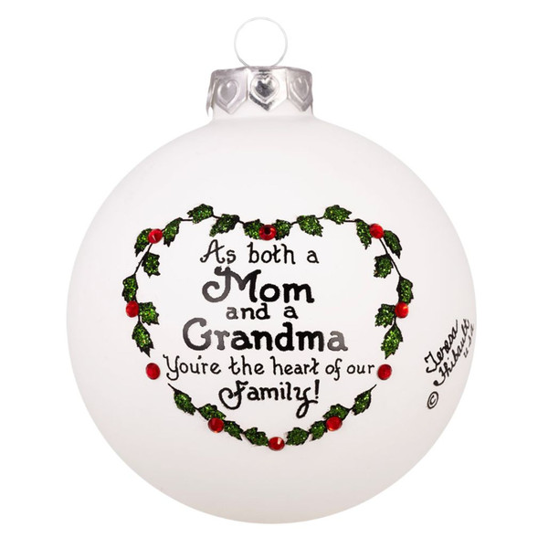 White round glass ornament for a mom and grandma with holly heart design.
Ornament reads “As both a Mom and a Grandma You’re the heart of our family!”
Glass ornament with silver cap, green holly, red crystal accents, and black lettering.