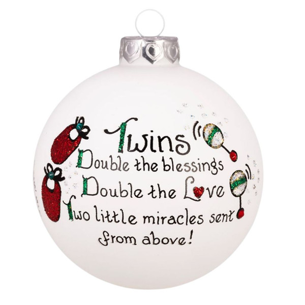 White round glass twins ornament with baby booties and rattles.
Ornament reads “Twins Double the blessings Double the Love.”
Glass ornament with silver cap, red and green glitter, and Swarovski crystal accents.