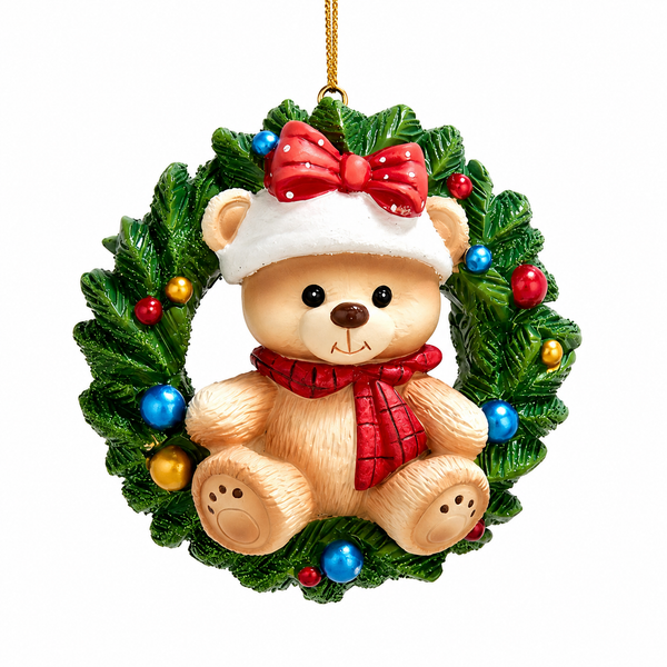 Tan teddy bear Christmas ornament sitting inside a green holiday wreath.
Resin ornament featuring a red scarf, red bow, and colorful decorative ornaments.
3.35-inch Christmas wreath ornament with teddy bear and gold hanging cord.