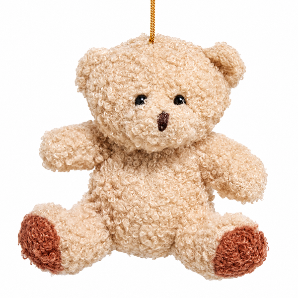 Tan teddy bear Christmas ornament with curly plush-style texture.
Fabric mache teddy bear ornament with black eyes, stitched nose, and brown paw pads.
4-inch teddy bear holiday ornament hanging from a gold cord.