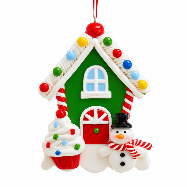 Snowman sweets house Christmas ornament with green house, red door, and candy cane trim.
Claydough ornament featuring a snowman, frosted cupcake, and colorful roof lights.
4.5-inch candy-themed holiday ornament hanging from a red ribbon.