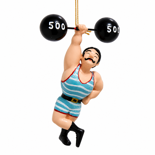 Carnival strongman Christmas ornament lifting a black barbell overhead.
Resin ornament with mustached strongman in blue striped singlet and black boots.
4-inch Kurt Adler hanging ornament with circus-inspired strongman design.