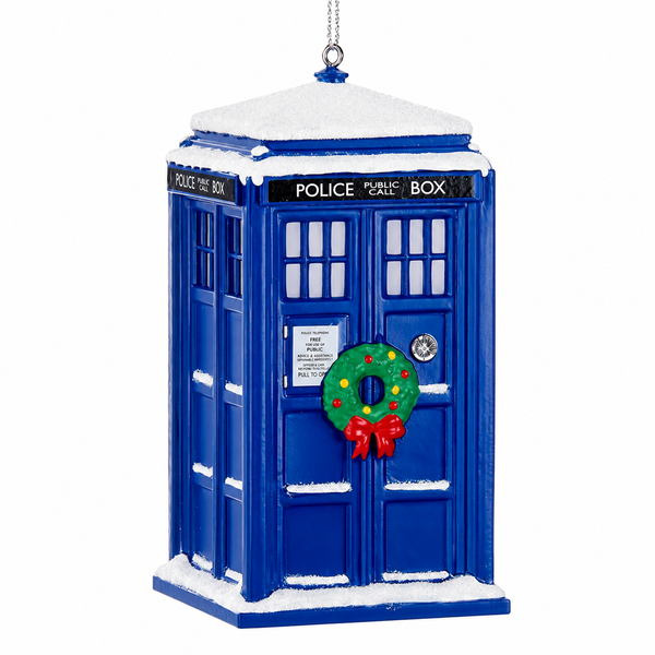 Doctor Who TARDIS Christmas ornament with holiday wreath and snowy details.
Blue police box ornament featuring a festive light-up effect.
Official Doctor Who collectible ornament measuring approximately 4.25 inches tall.