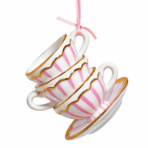 Stacked striped tea cup ornament with pink stripes and gold trim.
Porcelain tea cup Christmas ornament with scalloped edges and pink ribbon.
3-inch Kurt Adler hanging ornament for tea lover and kitchen holiday décor.