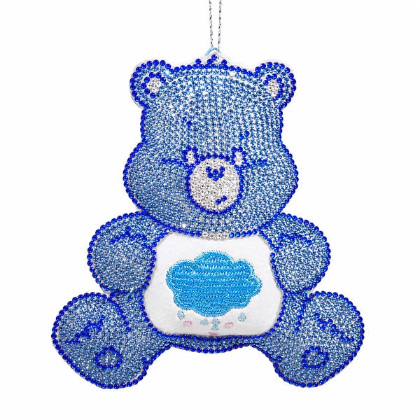 Blue bedazzled Grumpy Bear ornament with sparkling gem details and cloud belly badge.
4-inch hanging character ornament made from Fabmache, plastic, and polyester.
Care Bears-style holiday ornament with blue rhinestone-style accents and attached cord.
