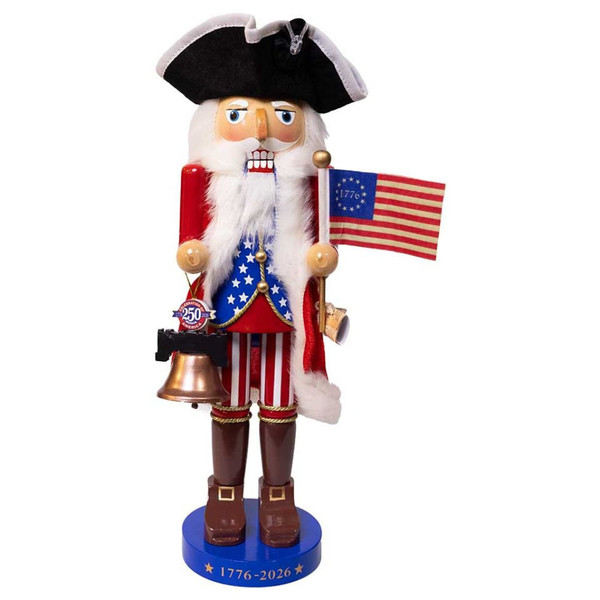 14-inch patriotic nutcracker with tricorn hat, red cape, flag, bell, and 1776–2026 blue base.
Side view of Kurt Adler America anniversary nutcracker with white faux fur trim and brown boots.
Red, white, and blue 250th Anniversary of America Nutcracker holding flag and copper-tone bell.