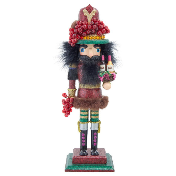 16-inch wine-themed Hollywood nutcracker with grape clusters, bottle accents, and glittered red and green outfit.
Kurt Adler Wine Nutcracker with black faux fur hair and beard, vineyard details, and layered display base.
Decorative nutcracker holding grapes and wine bottles for mantel, bar cart, or dining room holiday display.