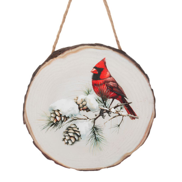 Cardinal wood slice Christmas ornament with snowy pine branches and pinecones.
Round resin ornament with natural wood slice look and jute hanging cord.
Rustic bird ornament featuring a red cardinal perched on winter greenery.