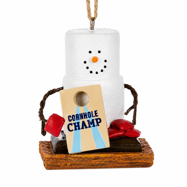 Marshmallow snowman ornament holding a cornhole bean bag beside a game board.
Resin s'mores-themed Christmas ornament with "Cornhole Champ" design.
Novelty cornhole ornament measuring 1 7/8" W x 2 5/8" H.
