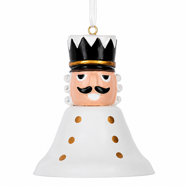 White bell-shaped nutcracker ornament with black crown hat and gold accents.
Hanging Christmas ornament featuring a nutcracker face and white bell body.
Metal and resin nutcracker bell ornament measuring approximately 2.5 x 2.5 inches.