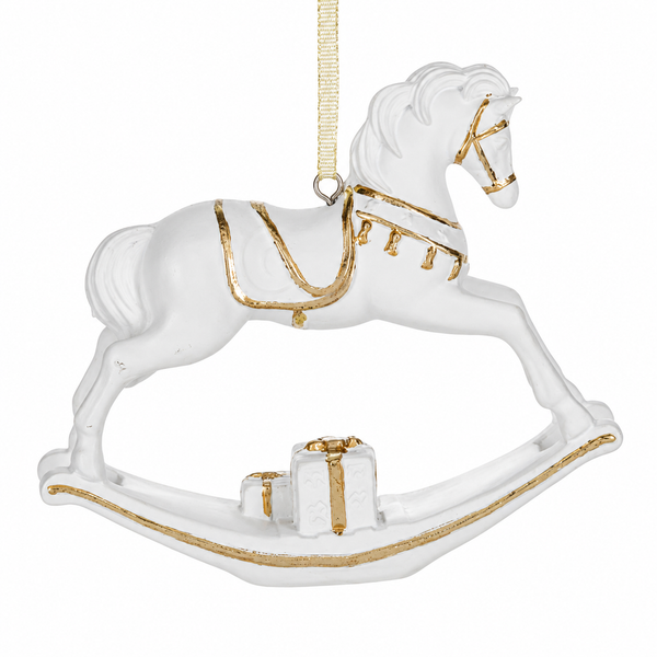White resin rocking horse ornament with gold trim and hanging ribbon.
Rocking horse Christmas ornament with gold saddle, bridle, rocker, and gift details.
Resin Rocking Horse Ornament measuring 3.25 x 4.25 inches.