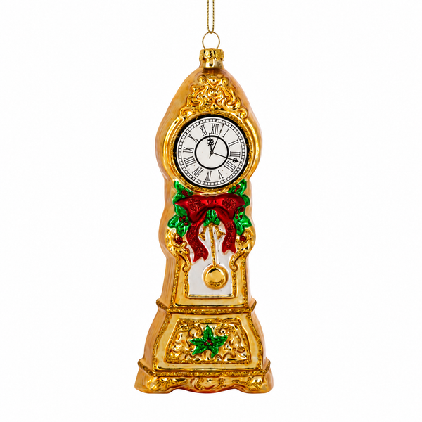 Glass grandfather clock ornament with gold finish, clock face, red bow, and holly accents.
Tall Christmas clock ornament with pendulum detail and ornate gold trim.
Grandfather clock ornament measuring 2.5 x 6 inches.