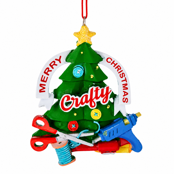 Craft-themed Christmas tree ornament with a gold star topper and "Merry Christmas Crafty" banner.
Resin ornament featuring scissors, thread spool, buttons, glue gun, and crafting tools around a green tree.
Holiday hanging ornament measuring 3 1/8 x 3 3/8 inches with colorful maker-inspired details.
