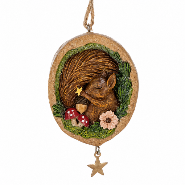 Squirrel ornament nestled inside a walnut shell with woodland greenery accents.
Resin Christmas ornament featuring mushrooms, an acorn, flowers, and hanging stars.
Nature-inspired holiday ornament measuring approximately 2 1/8 x 3 1/4 inches.