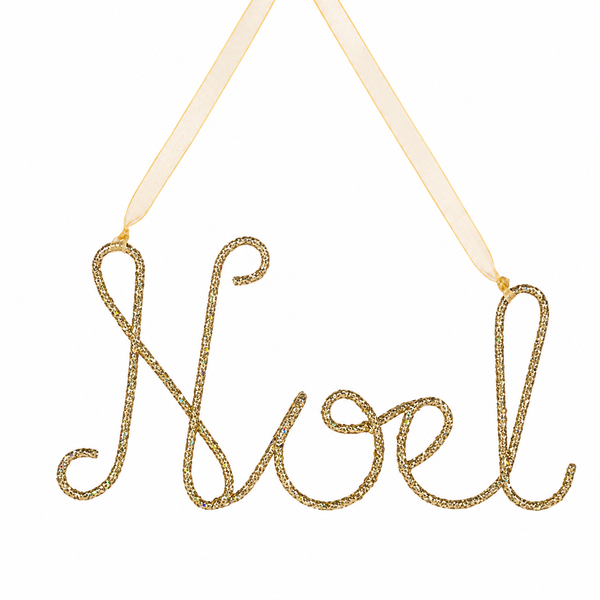 Gold glitter Noel ornament in script lettering hanging from ribbon.
Plastic Christmas word ornament spelling Noel with a sheer gold ribbon.
5.5 x 3.25 inch Noel ornament for tree, wreath, or garland décor.