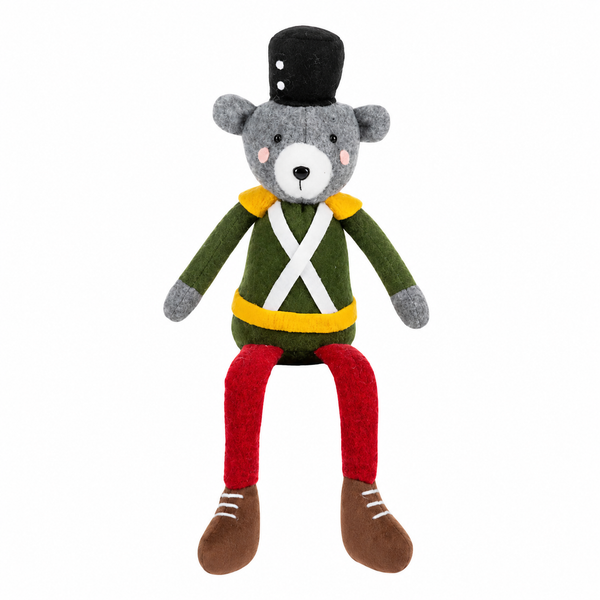 Gray bear soldier shelf sitter wearing a green jacket, red legs, and black hat.
Holiday bear shelf sitter with yellow trim, white cross straps, and brown shoes.
Polyester and sand bear soldier decoration for mantels and shelves.