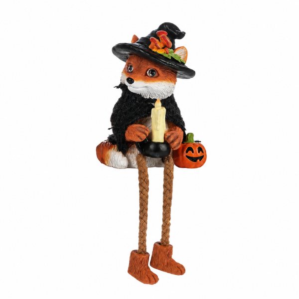Fox witch shelfsitter wearing a black hat and cloak while holding a candle.
Polyresin Halloween fox with dangling legs and jack-o’-lantern accent.
7-inch fox witch shelf decoration for mantel or tabletop display.