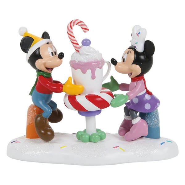Department 56 Disney Village Mickey and Minnie cocoa accessory with oversized mug and candy cane.
Polyresin Mickey and Minnie figurine on snowy sprinkle base for Disney Village display.
A Cocoa With A Cutie! accessory shown from multiple angles with colorful winter details.