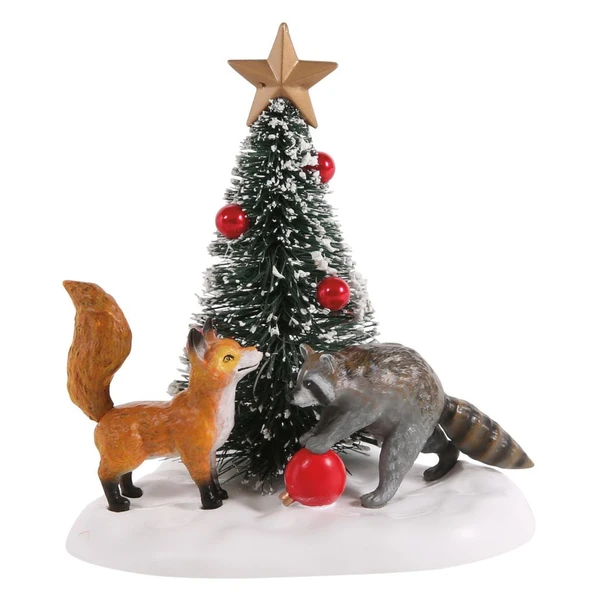 Department 56 Your Turn! accessory with fox, raccoon, and decorated sisal Christmas tree.
Cross Village woodland scene with red ornaments, gold star tree topper, and snowy base.
Polyresin and sisal village accessory measuring 3 inches high for holiday display scenes.