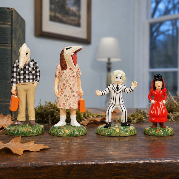 Department 56 Snow Village Halloween Beetlejuice Trick or Treaters Set of 4 Accessory – collectible Christmas village piece displayed in a cosy home