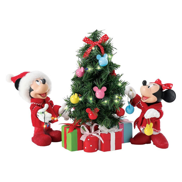 Department 56 Possible Dreams Mickey Mouse Decorations figurine with Mickey, Minnie, and a lit Christmas tree.
Officially licensed Disney 3-piece collectible with colorful ornaments, wrapped gifts, and LED tree lights.
Possible Dreams Mickey Mouse Decorations figurine measuring 9 inches high with PVC, LED, polyester, Clothtique, and battery box.