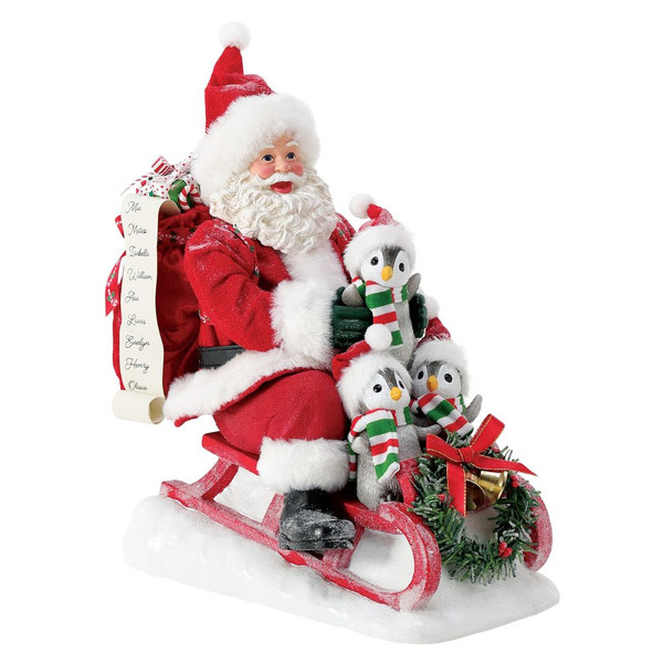 Department 56 Possible Dreams Penguining to Look Like Xmas figurine with Santa and three penguins on a red sleigh.
Santa collectible with bundled penguin chicks, gift sack, scroll list, wreath, bells, and snowy base.
Possible Dreams Penguining to Look Like Xmas figurine measuring 9 inches high with PVC, polyester, resin, and Clothtique materials.