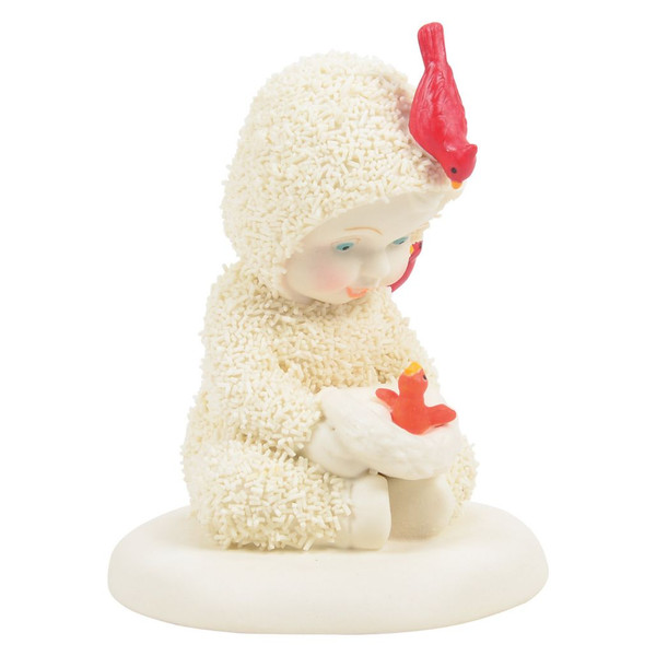 Snowbabies "Hatched In Time For Christmas" porcelain figurine with a Snowbaby holding a tiny cardinal nestling.
Handcrafted bisque porcelain collectible featuring two bright red cardinals perched on the Snowbaby's hood and shoulder.
Holiday figurine with textured Snowbaby suit, cardinal birds, and snowy sculpted base.