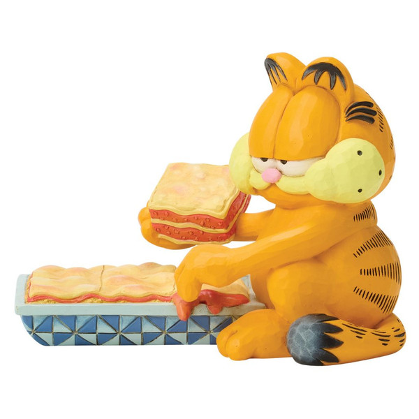 Jim Shore Garfield figurine holding a large slice of lasagna beside a baking dish.
Hand-painted stone resin Garfield collectible featuring quilt-inspired folk-art details and a pan of lasagna.
Garfield with stuffed cheeks and oversized lasagna slice from the Heartwood Creek Collection.
