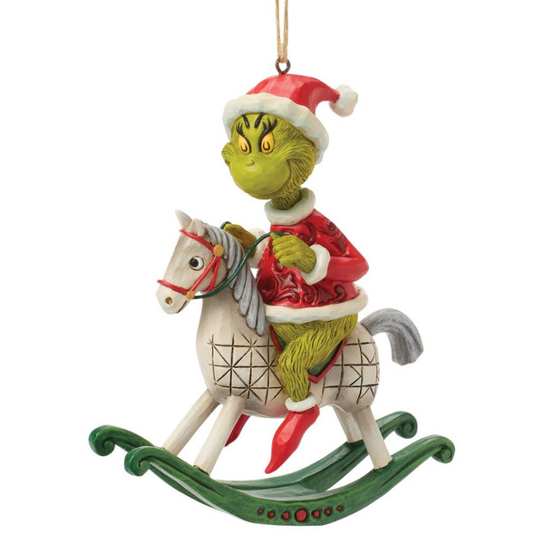 Front view of Jim Shore Grinch on Rocking Horse ornament featuring the Grinch in a Santa suit riding a white wooden rocking horse.
Side and rear views showing hand-painted folk-art details, quilt-inspired patterns, and green rocker base on the stone resin ornament.
Jim Shore Dr. Seuss Grinch Christmas ornament with rocking horse, hanging cord, and handcrafted finish.