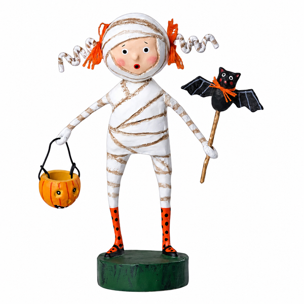 Minnie Mummy Halloween figurine wrapped in white bandages with orange pigtails.
6-inch poly resin character holding a pumpkin candy bucket and a black bat wand.
Whimsical Halloween tabletop decoration on a green display base.