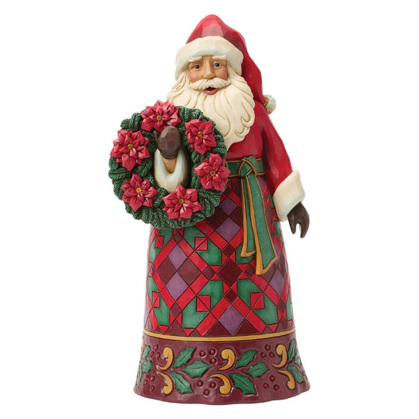 Jim Shore Christmas Offering Santa figurine holding an evergreen wreath decorated with red poinsettias.
Hand-painted stone resin Santa with Heartwood Creek folk-art patterns and festive Christmas wreath.
Traditional Santa collectible featuring quilt-inspired details, holly accents, and poinsettia wreath.