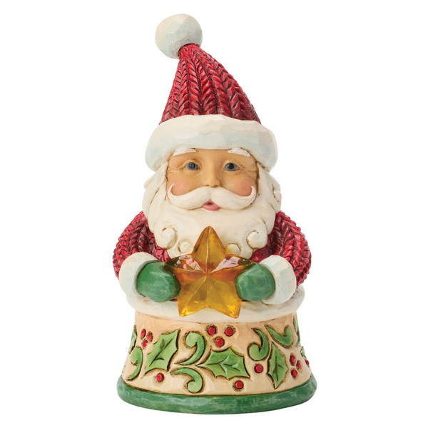 Jim Shore Santa Holding Star Mini Figurine featuring Santa holding a golden star.
Hand-painted stone resin Santa collectible with textured knit-style coat and Heartwood Creek folk-art details.
Mini Christmas Santa figurine measuring 3.75 inches tall with festive holly accents.