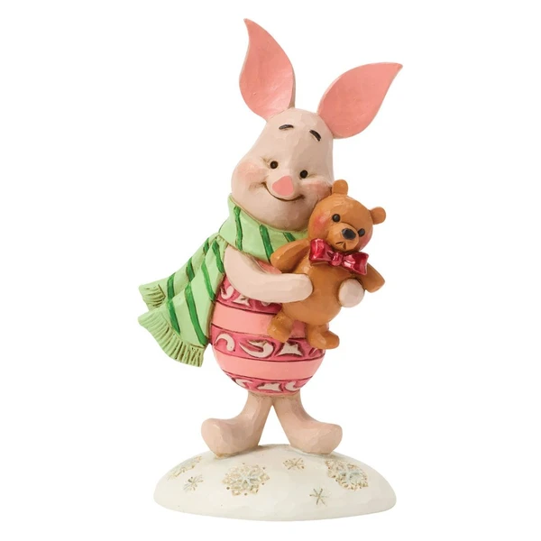 Alt 1: Jim Shore Disney Traditions Piglet Mini figurine holding a teddy bear while wearing a green holiday scarf.

Alt 2: Hand-painted stone resin Piglet collectible featuring a festive scarf and teddy bear with red bow.

Alt 3: Disney Traditions Piglet mini holiday figurine inspired by Winnie the Pooh and the Hundred Acre Wood