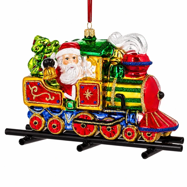 Huras Family Santa Calling All Aboard 4-inch handblown glass Christmas train ornament.

Colorful glass locomotive ornament with Santa ringing a bell, Christmas tree, red wheels, and black train tracks.

Polish glass Santa train ornament decorated in red, green, blue, and gold with glittered accents.