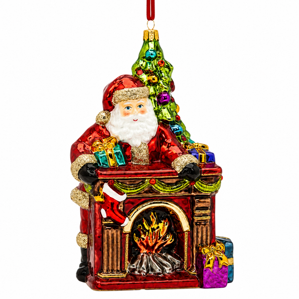 Huras Family The Holly Hearth 7.5-inch handblown glass Christmas ornament with Santa and a festive fireplace.

Santa ornament with decorated Christmas tree, glowing fireplace, green garland, red stocking, and colorful wrapped presents.

Hand-painted Polish glass Christmas ornament featuring Santa at a red fireplace with glittering gold trim and jewel-tone gifts.