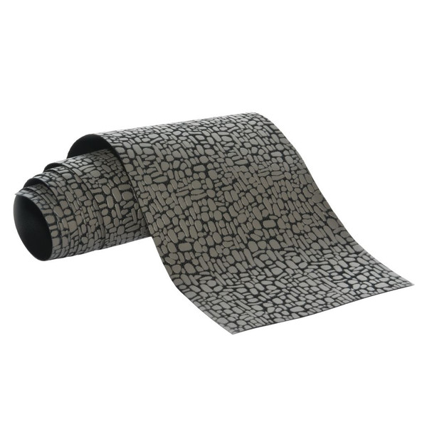 Flexible Department 56 cobblestone street roll with realistic stone pattern.
Fabric mache village roadway measuring 4 feet long and 4.75 inches wide.
Trim-to-fit cobblestone street accessory for Christmas village displays.