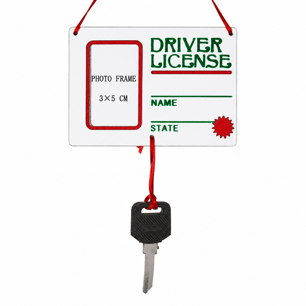 Driver's License photo frame Christmas ornament with attached miniature car key.
5-inch personalized ornament designed to hold a 3 × 5 cm photo.
Novelty keepsake ornament for celebrating a new driver's license or graduation.