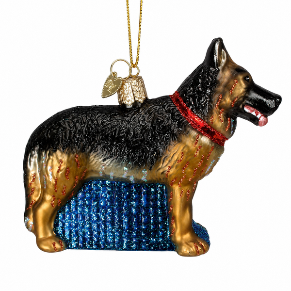 Handcrafted Old World Christmas German Shepherd glass ornament with a black and tan coat and red glitter collar.
Mouth-blown glass dog ornament featuring hand-painted details and shimmering glitter accents.
German Shepherd Christmas ornament measuring 3.5 inches tall by 4.25 inches wide.