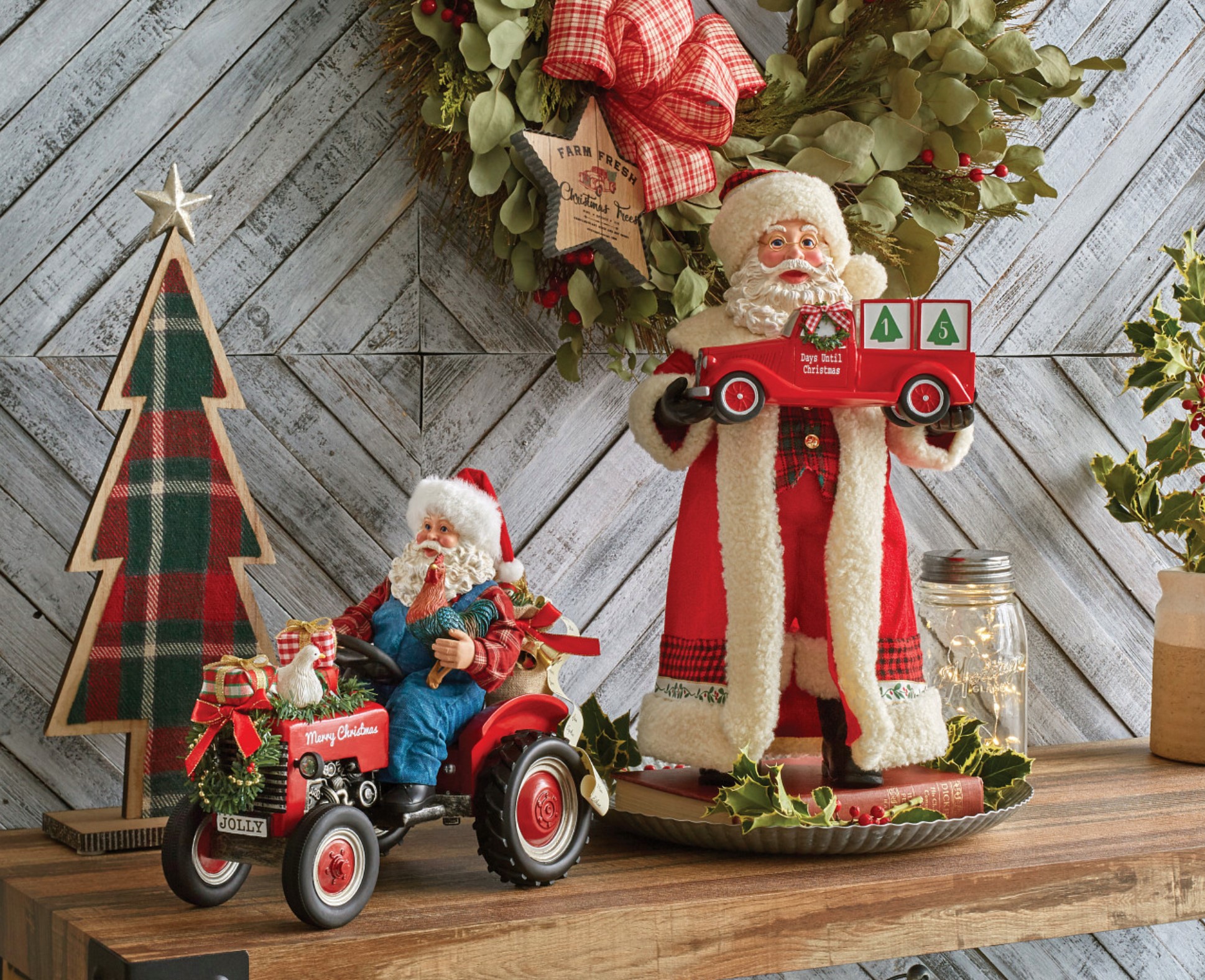 Stylized photo of Department 56 Possible Dreams Santa Figurines. One is riding a tractor and the other is a countdown to Christmas