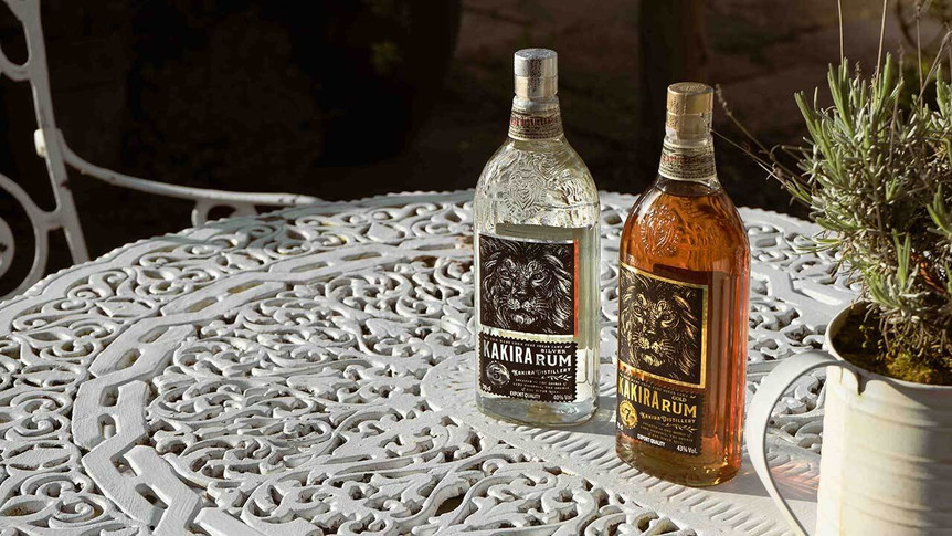 A photo of Kakira's rum range on a garden table