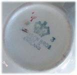 milk-or-creamer-pouring-jug-old-english-semi-porcelain-johnson-brothers-cherry-blossoms-jb734-hand-decorated-backstamp-closeup.jpg