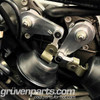 GruvenParts high-strength aircraft aluminum intake manifold actuator linkage arm installation on Audi and VW 4.2L V8 engines, replacing brittle OEM plastic parts 077-198-327A.