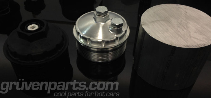 Billet 6061-T651 (right), machined cap (center), plastic OEM (left)
