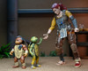 NECA Teenage Mutant Ninja Turtles (The Last Ronin- The Lost Years) - 7” Scale Action Figure - Grammy April with Baby Yi & Moja