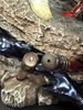 One black piece on the bust has come off during shipping, SEE PHOTO.
