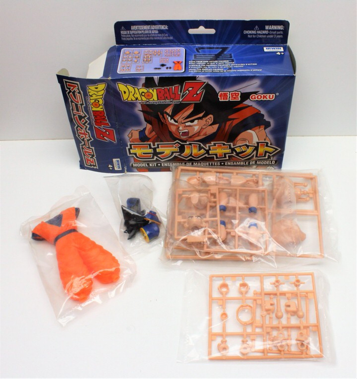 Kit Dragon Ball Z: Action Figure Goku + Mangás - Vol. 40, 41 e 42 - Geek  Point