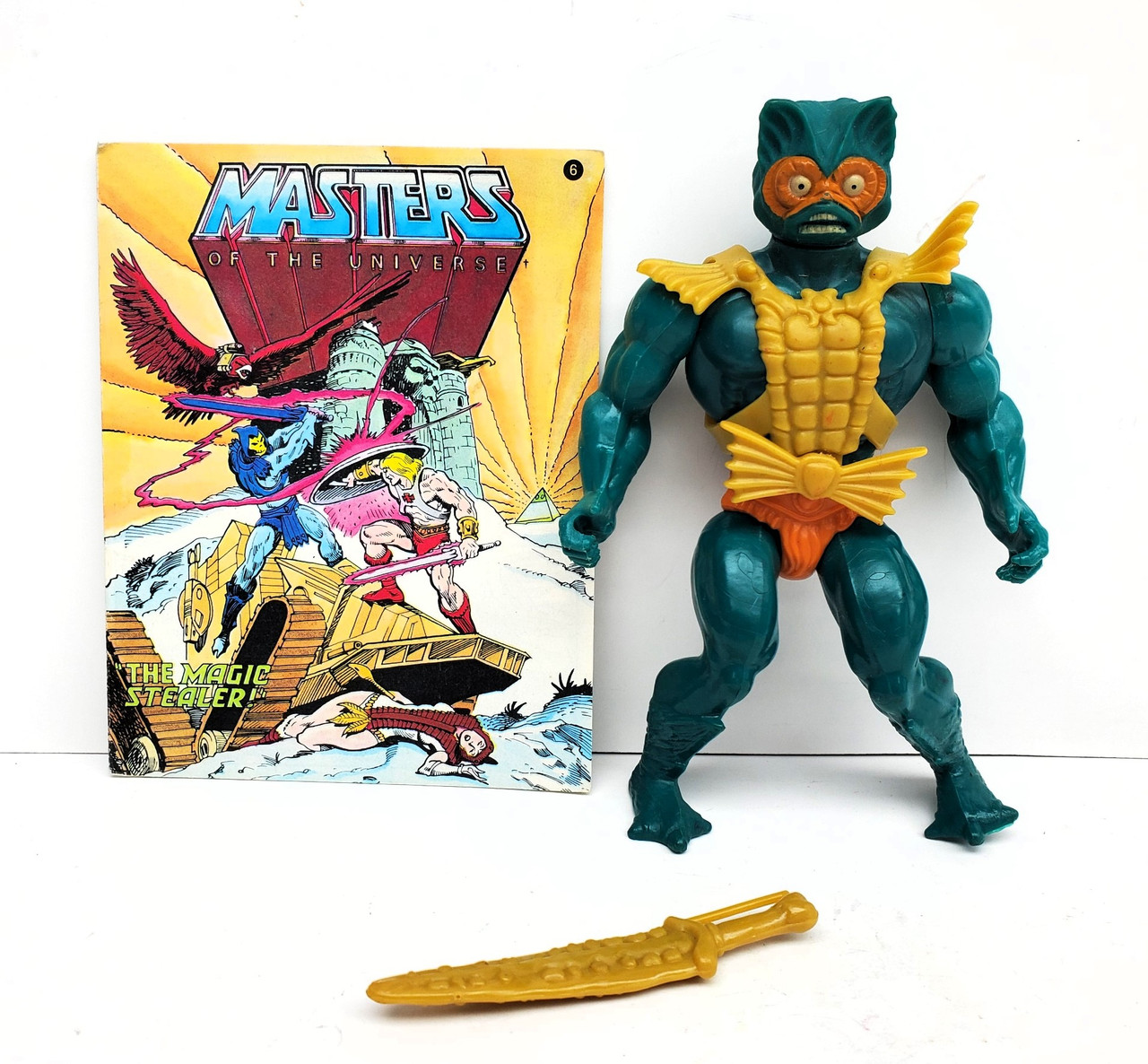 Merman トゥーダラー　M Mattel (1982) MOTU MERMAN action figure with comic