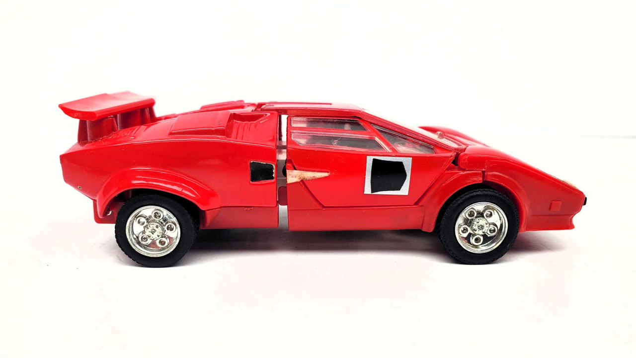 Takara (1980) Diaclone Mini Car Robot Red Lamborghi LP500S with driver