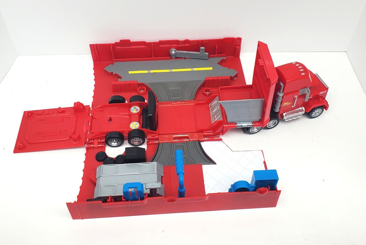 Disney Pixar Cars MACK transforming truck playset and 13 CARS (no